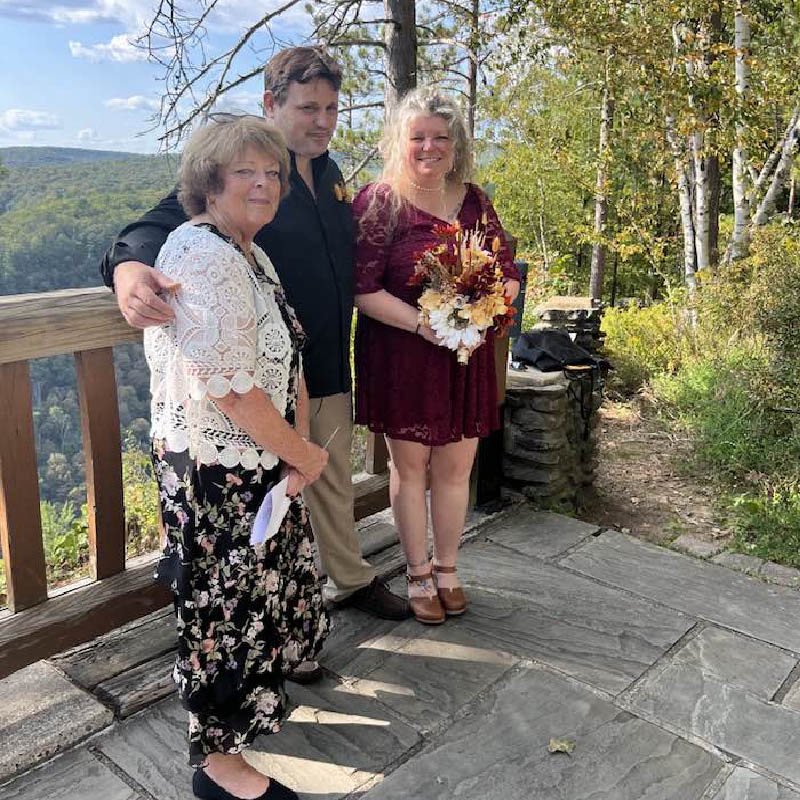 Wedding Officiant Robin with newly married couple